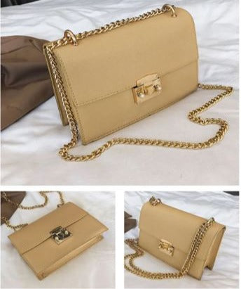 Image of a women's chain strap gold leather shoulder bag