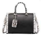 Image of a black snakeskin leather purse bag