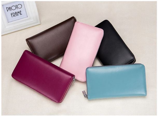 Image of multiple women's leather clutch wallets with anti-theft RFID feature 5 Colors in wine, pink, brown, black, blue