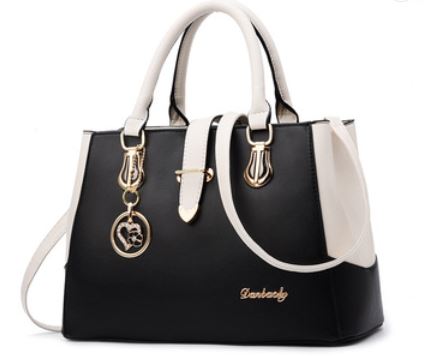 Image of a women's black executive inspired handbag