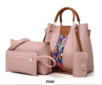 Image of a pink four-piece purse set with tribal print trim, including a large tote Bag, a large shoulder bag, a wallet-sized accessory bag, and a cardholder wallet. 